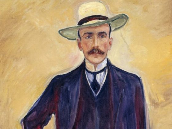Edvard Munchs Porträt von Harry Graf Kessler zeigt vor hellgelbem Hintergrund einen schlanken, eleganten Mann mit schmalem Gesicht, Schnurrbart und blauen Augen. Er trägt einen dunkelblauen Anzug mit Weste, ein weißes Hemd mit dunkelblauer Krawatte und einen hellen Sommerhut. Er strahlt Intelligenz und Melancholie aus.
